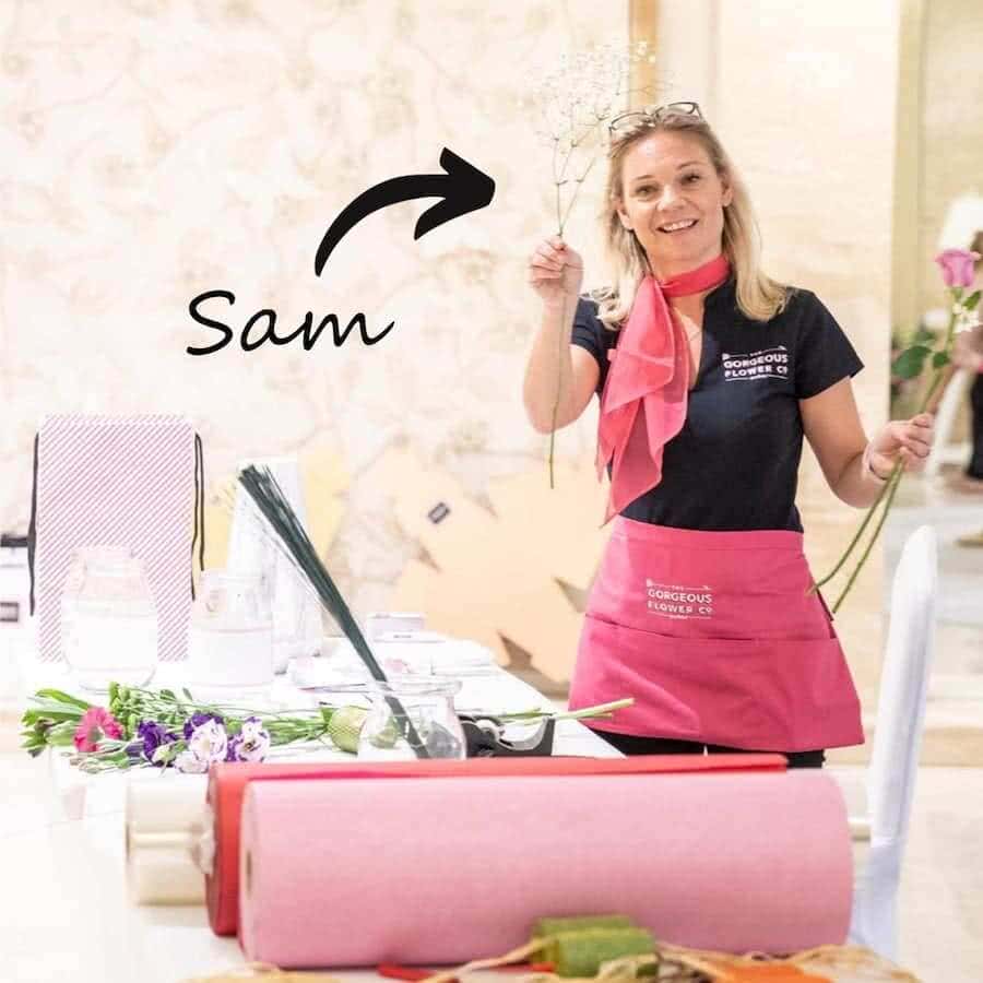The gorgeous flower company Sam Middleton preparing a bouquet for a customer